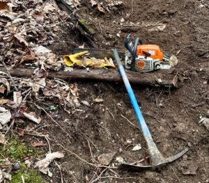 Mattock and Chainsaw; tools needed to build a trail