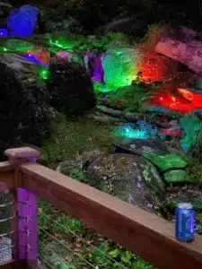 Private cabin with hot tub in North Carolina above a waterfall creek at Windows Over Waterfalls in Hot Springs NC