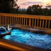 valentine's day getawayswith a Hot tub above the creek with lit waterfalls at Windows Over Waterfalls near Hot Springs NC